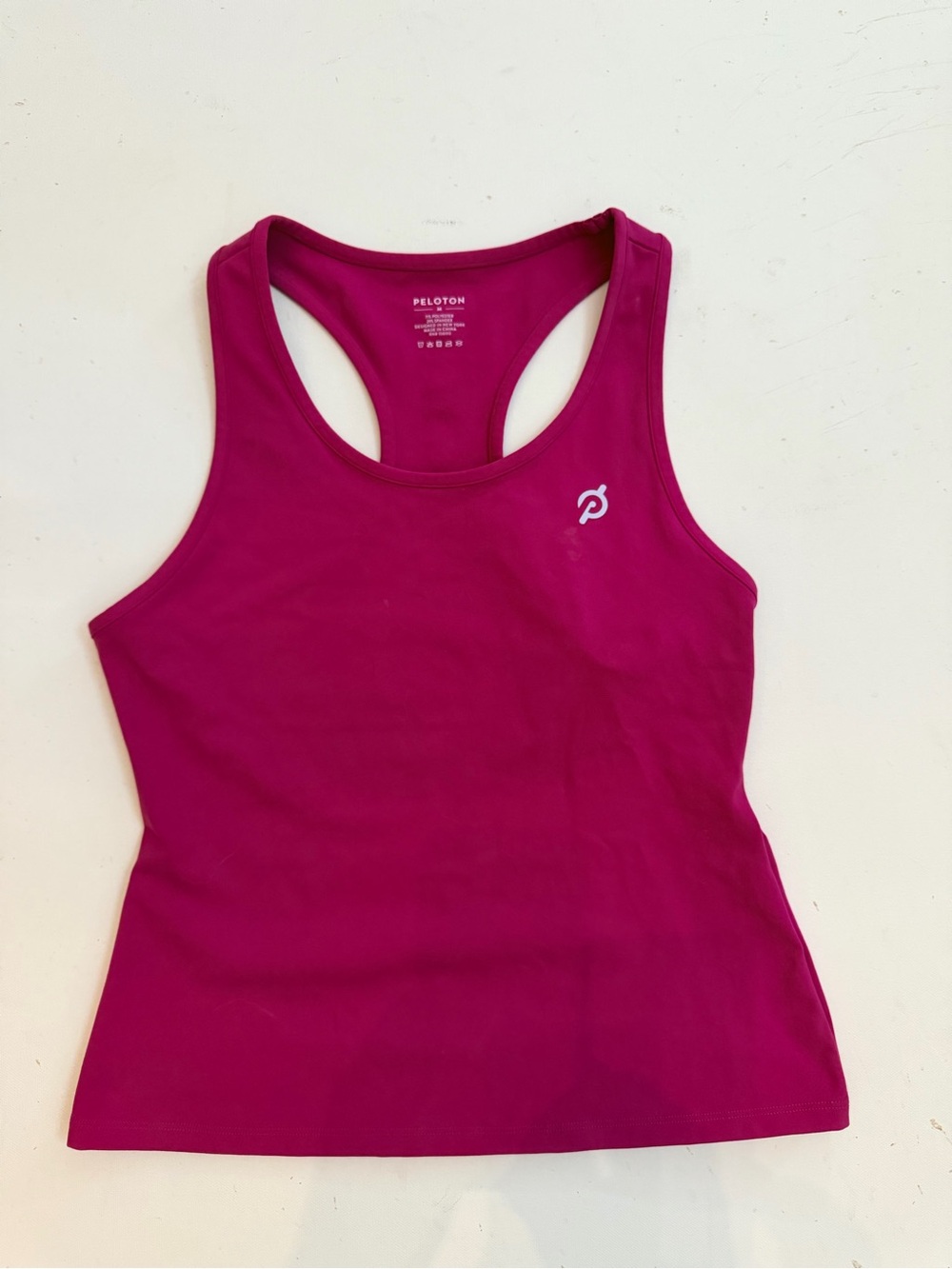 Peloton fuchsia racer back athletic tank top